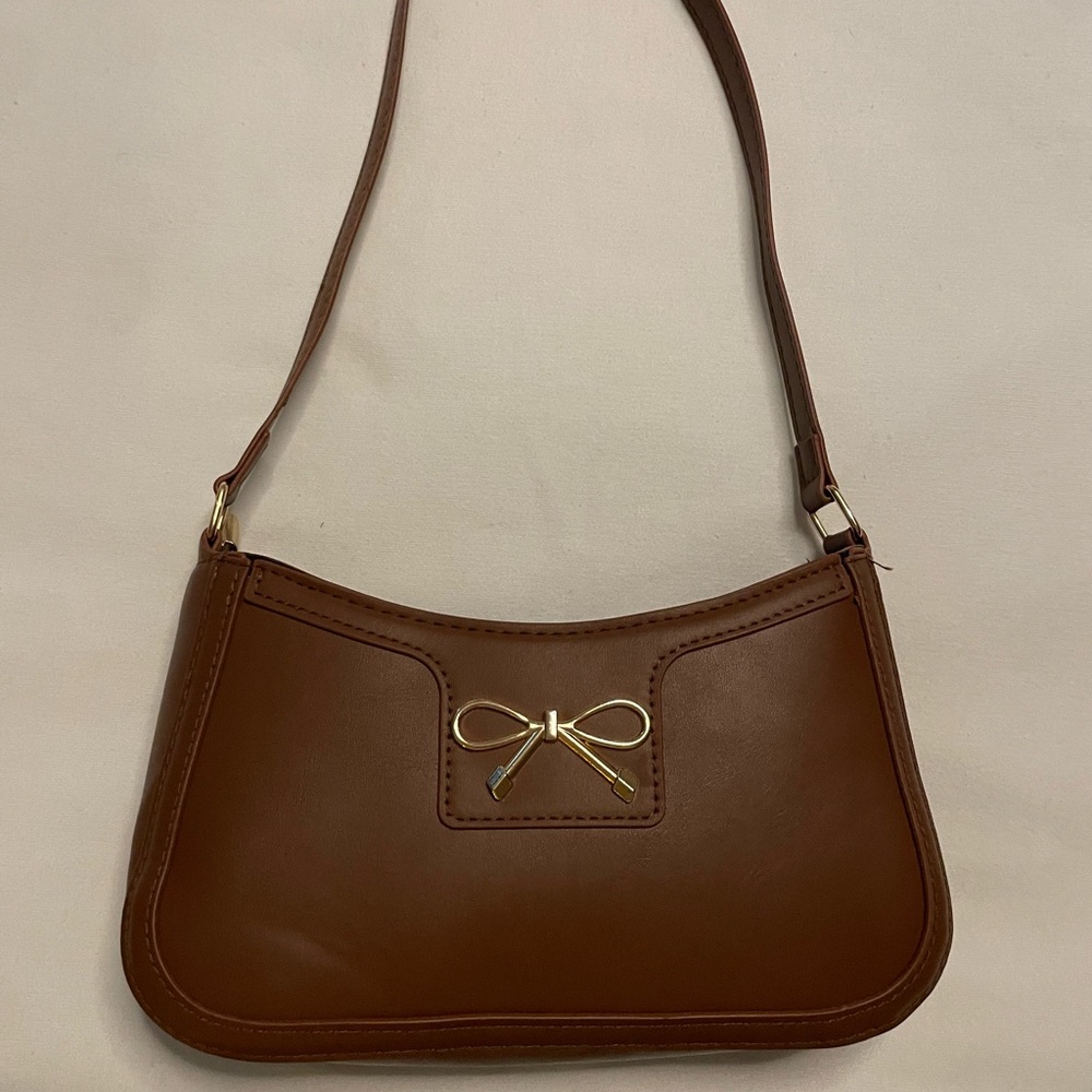 New Purse With Gold Bow Detail.